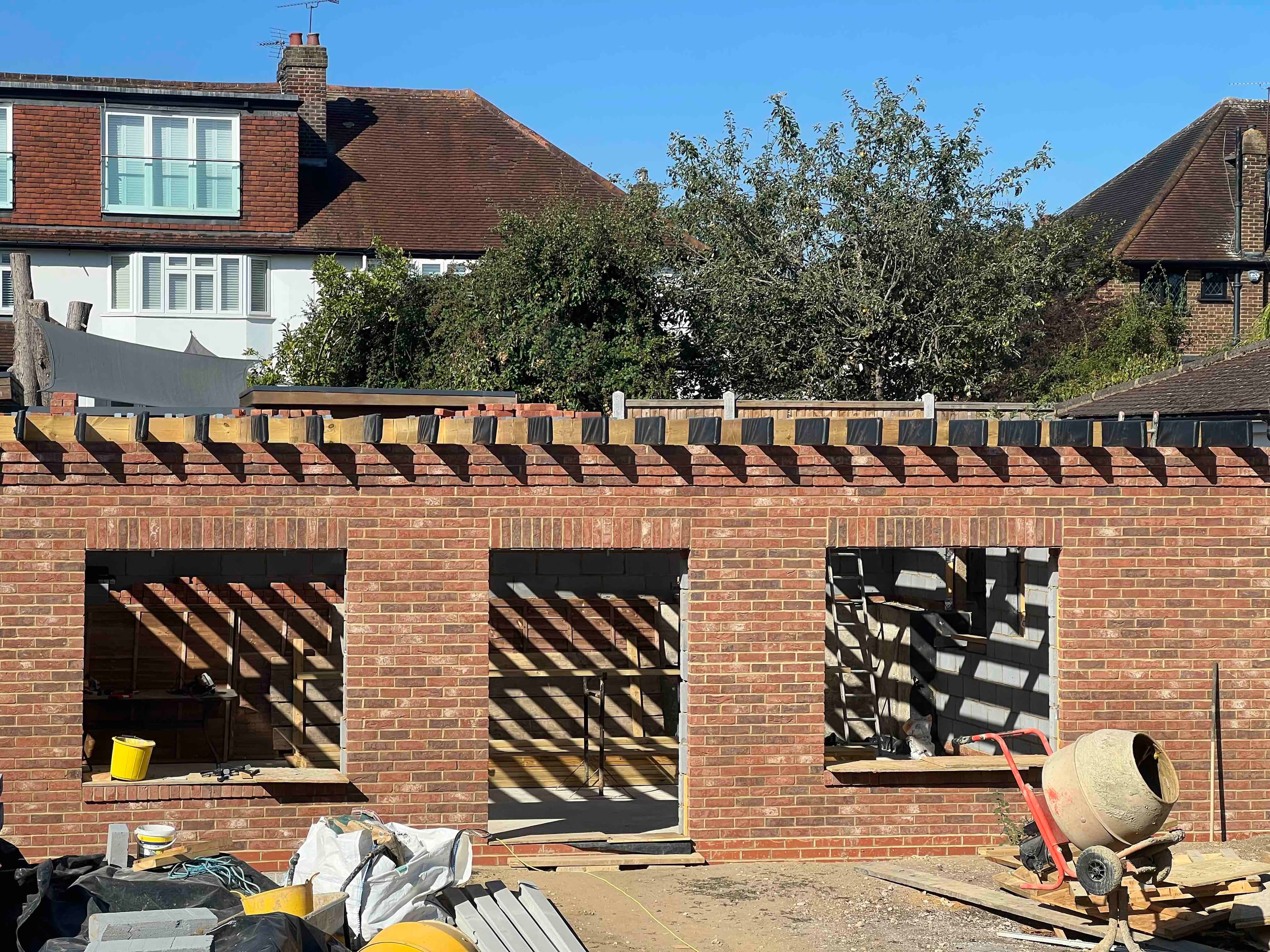 Brick masonry and principal openings under construction at Chigwell residential project